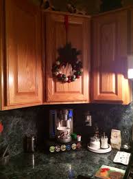 to hang a wreath on a kitchen cabinet