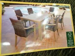 Costco 1031565 7pc Teak Dining Set With Woven Stacking Arm Chairs Pic Comfortable Living Room Chairs Outdoor Furniture Sets Comfortable Accent Chairs