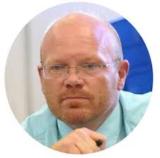 About Dr. Tom Miller