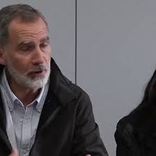 Spain's king vows to give 'hope' after angry residents throw mud