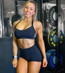 Powerful arabic woman cross fit trainer in hijab do battle workout with ropes at the gym alone female flipping tire at the gym. 40 Hottest Fitness Models To Follow On Instagram Swagger Magazine