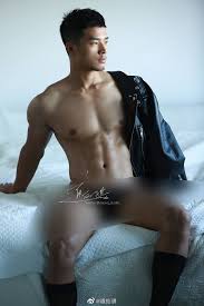 Hot Asian stud flexing for camera - tempting body