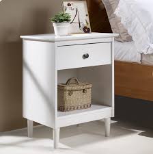 Finished on all sides for versatile placement; Classic Mid Century Modern 1 Drawer Solid Wood Nightstand Side Table In White Walker Edison Br1dnswh