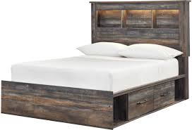Bedroom sets with bed and other accessories should be made with strong quality material like wood or metal. Signature Design By Ashley Drystan Rustic Full Bookcase Bed With Underbed Storage Value City Furniture Bookcase Beds