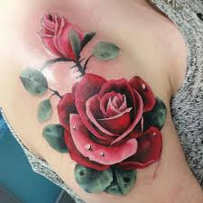 Most realistic, beautiful realism rose and skeleton tattoo design fir leg and foot. Realistic Red Roses With Dew Tattoo On Shoulder