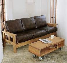 Cushions on a wooden sofa with artificial leather seat. Pin On Chair Ideas