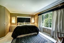 Elegant Bedroom With Light Grey Curtains Beautiful Bedding With Stock Photo Picture And Royalty Free Image Image 30369912