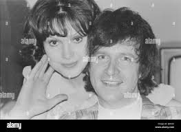 Actress Madeline Smith pictured at home with her boyfriend film actor David  Buck. 10th August 1975. *** Local Caption *** Maddy Smith Stock Photo