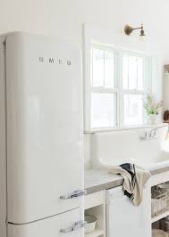 Kitchen Of The Week In Montana Rustic Chic On A Budget Remodelista Smeg Fridge Kitchen Remodel Vintage Kitchen