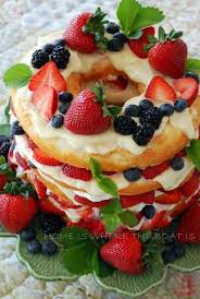 A Light Summer Dessert A Jar Of Lemon Curd Whipped With Light Cream Cheese On A Split Angel Food Cake And Fresh Lus Desserts Light Summer Desserts Angel Food