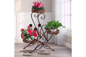 Opt for simple, colorful flowers like orchids or azaleas. Levede Plant Stand Outdoor Indoor Metal Flower Pots Rack Corner Planter Shelf Matt Blatt