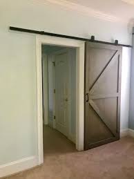 And when it comes to your bathroom and if you're dealing with a master en suite bathroom, a rich, textured interior barn door can be a dramatic pop of depth, color, and visual. Can I Use A Barn Door For A Bathroom