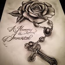 Others take the idea to symbolize jesus christ and the others who were crucified with him. Rose With Cross Tattoo
