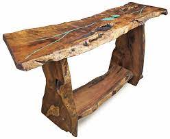 Here's one way to create a turquoise inlay: Free Form Slab Mesquite Sofa Table With Turquoise Inlay