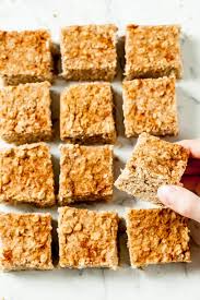 Only 9 ingredients, 4 grams net carbs, & ready in 20 minutes! Chewy Apple Oatmeal Bars Gluten Free Dairy Free Refined Sugar Free Chew Out Loud