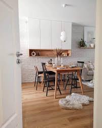 A striking ceiling pendant and artwork help make this small room feel grand and chic. Ideas For Decorating A Small Dining Room Postgreeny