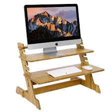 Some offer height adjustment for sitting and standing positions, while others are highly durable and can support multiple screens. Totally Bamboo Adjustable Latop Table Stand Up Desk Riser Standing Computer Riser For Home Office Buy Computer Standing Desk Bamboo Laptop Table Wooden Computer Standing Desk Product On Alibaba Com