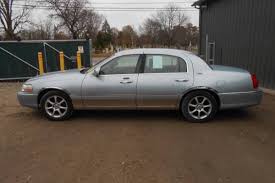 Image result for Light Ice Blue 2010 Town Car