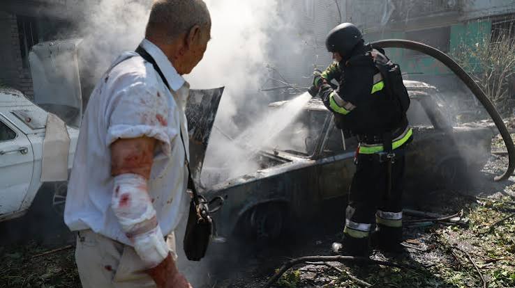 Emergency personnel at the site of a damaged industrial facility in Tatarstan following a Ukrainian drone strike.