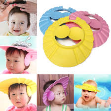 The soft elastic ring easily fits on the child's head and helps in blocking of water from getting into the eyes and ears. Wholesale Eeezeee Baby Bath Shower Cap Random Eeezeee
