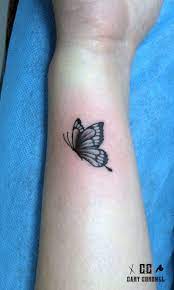 Butterfly tattoos are very common nowadays but artists still find beautiful and original ways to make unlike most butterfly tattoos, this tattoo has a lot of asymmetry going on. Butterfly Tattoo Butterfly Wrist Tattoo Butterfly Tattoo Butterfly Tattoo Designs
