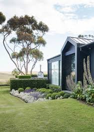 10 Coastal Gardens That Are Robust And Beautiful Mediterranean Garden Design Naturalistic Garden Coastal Gardens