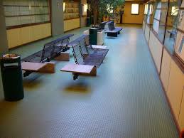 Pros And Cons Of Rubber Flooring Properties Rubber Flooring Flooring Ceramic Floor Tiles