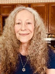 72 years, I find long hair easier to care for..