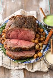Prime rib roast is sometimes called standing rib roast and refers to the 6th to 12th rib section of the rib primal from a beef cow. These Easter Dinner Ideas Will Make Your Holiday Meal A Success Prime Rib Roast Recipe Cooking Prime Rib Rib Roast Recipe