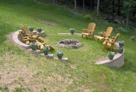 These past couple weeks have been especially hectic on the house—from long (if you're new here, we're renovating this house to turn into a vacation rental on a very tight budget and timeline. Loading Sloped Yard Fire Pit Backyard Sloped Backyard