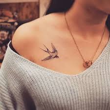 Small Bird With Red Neck And Chest Small Bird Shoulder Tattoo Grey Sweater Chest Tattoos For Women Gold Necklace Chest Tattoos For Women Shoulder Tattoos For Women Small Shoulder Tattoos