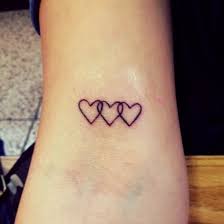 Little Bicep Tattoo Of Three Chained Hearts Neck Tattoo Heart Tattoo Wrist Tiny Tattoos