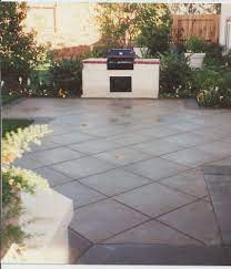 When thinking of building a new patio in your backyard, there are lots of different materials to choose from to construct it. Hannah Construction Photos Concrete Patio Deck Designs Backyard Concrete Patio Designs