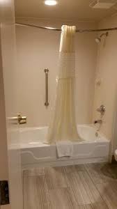 Corner tubs also come in a larger size, 72 inches by 72 inches, which. Shower Tub Combo With Curved Shower Curtain Rod To Give You More Space Picture Of Hampton Inn Peachtree Corners Norcross Tripadvisor