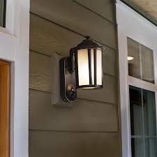 With its compact appearance, guardian does not need to call attention to itself, but has a quiet presence all of its own. Maximus 13 17 In H Bronze Dark Sky Medium Base E 26 Outdoor Wall Light Lowes Com Outdoor Wall Lighting Wall Lights Wall Sconce Lighting