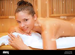 Naked woman in sauna Stock Photo - Alamy