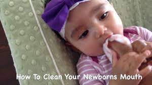 How to clean tongue of newborn baby. How To Clean Your Newborns Mouth Youtube