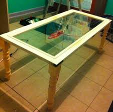 It is comprised of a salvaged window placed on top of a wooden frame with table legs. Ex Window Coffee Table Instructables