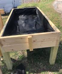 How To Build An Elevated Garden Bed Our Land And Home Elevated Garden Beds Raised Garden Beds Diy Elevated Gardening