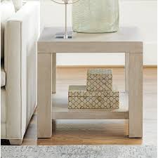 Here, a table and chairs gather on one side of the room, providing a spot for informal meals or games. 18 End Tables With Coastal Style