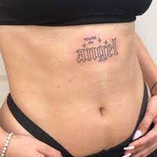 Words You Re An Angel Inked On A Belly By Hand Job Tattoo Belly Tattoos Belly Tattoo Hip Tattoo