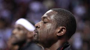 Dwyane Wade suffers dislocated finger, don't expect him back until playoffs 