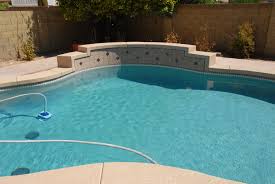 Swimming Pool Built By Dolphin Pools With Pebble Sheen Aqua Blue Pool Builders Pool Construction Dolphin Pools