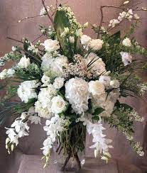 You can purchase online or come to our store to buy fresh cut flowers, plants, blooming plants, decorative trees, silk flowers, floral decor, vase flower arrangements, bulk flowers, flowers for weddings, funeral and sympathy flowers. Grand White Funeral Flowers And Flowers Darien Connecticut Ct