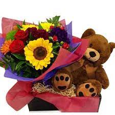 Item pictured is a depiction of an arrangement that we will make as similar as possible with the same look and feel. Flowers And Teddy Bear Gift Free Flower Delivery Auckland