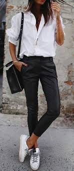 Black And White Button Up Shirt Outfit Spring Outfits Woman Wearing White Button Up Shirt With Black Pants Pic By Streetstyle Vision Top Sneakers Outfit Spring Outfits Classy Fashion