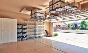 Garage With Storage Cabinets And Overhead Ceiling Racks Garage Ceiling Storage Overhead Garage Storage Diy Garage Storage