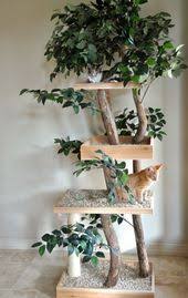 A Nature Inspired Cat Tree Made Of Twigs Artificial Greenery And Platforms With Ki Artificial Cat Greenery Ki Natur Kedi Agaclari Kedi Evi Branches