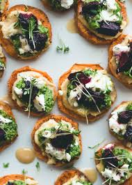 Sweet Potato Rounds With Hummus Pesto And Goat Cheese Recipe Food Appetizer Recipes Recipes