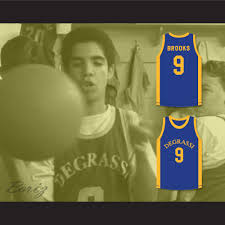 The rapper has not forgotten his roots; Drake Jimmy Brooks 9 Degrassi Community School Panthers Basketball Jersey Boriz